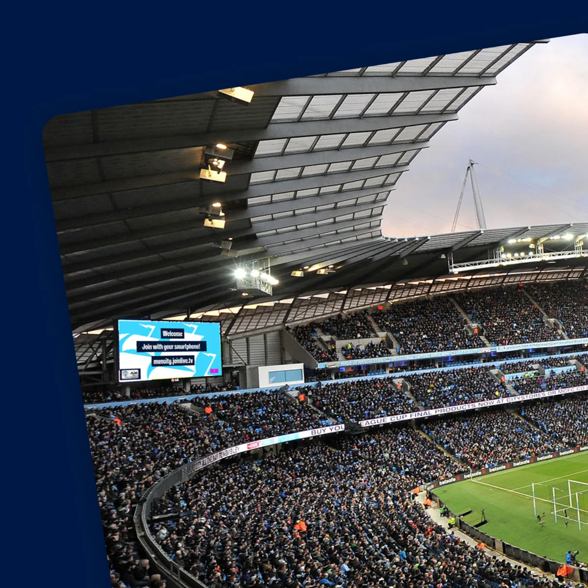 The Etihad big screen inviting fans to join with their smartphones