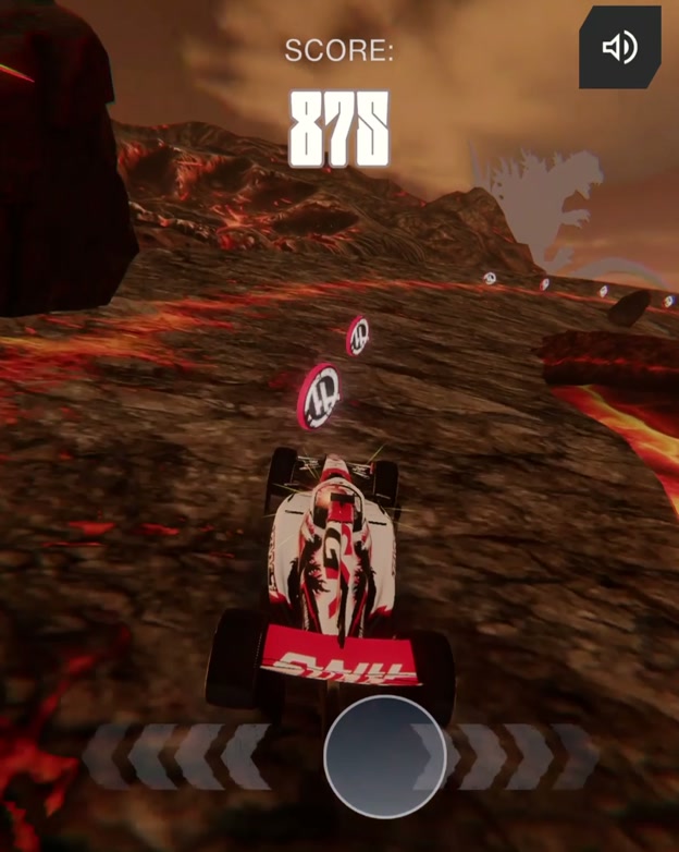 Mobile gameplay chasing the score past Haas-logo tokens as Godzilla looms on the ridge