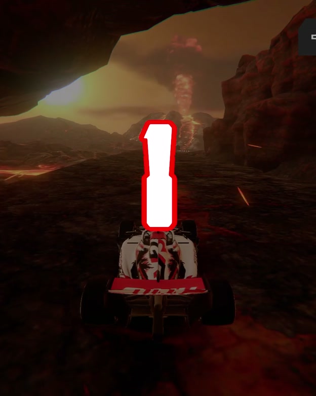 The Haas F1 car bursting out of a lava cavern at the start of a lap