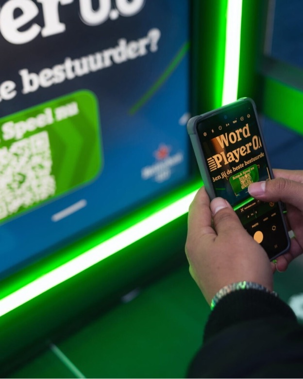 A fan scanning the shelter screen to launch Player 0.0 on their phone
