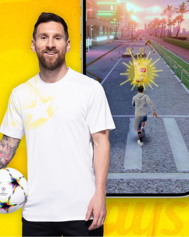 Lionel Messi beside a phone running the Miami-themed world