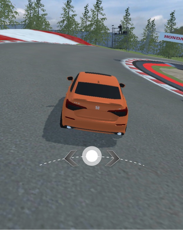A Honda Civic on the EvoTrack Circuit course, the tap-to-steer control on screen
